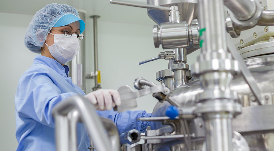 Worker in process piping sterile environment